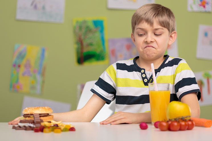 kid rejecting unhealthy food