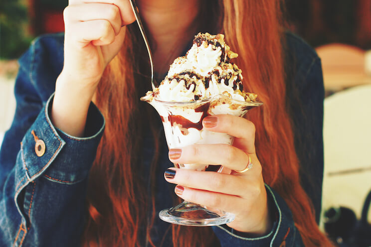 woman eating dessert