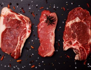 three cuts of raw steak