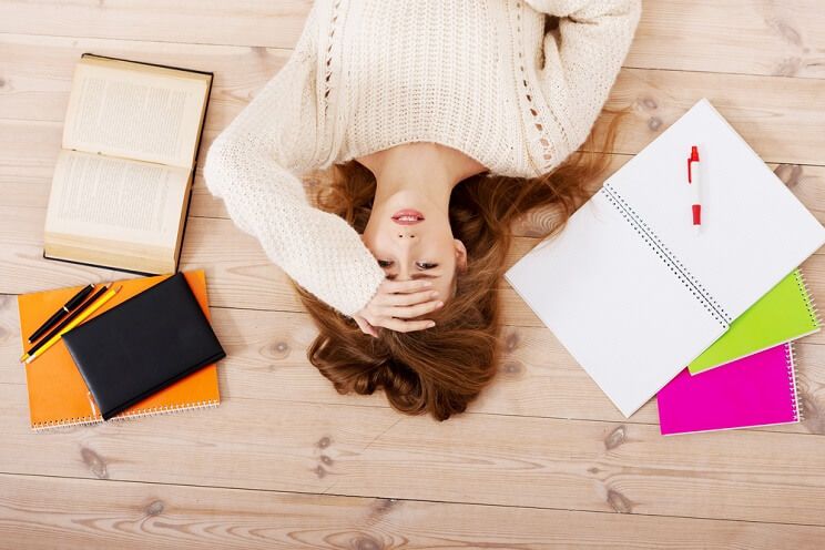 stressed woman preparing for finals