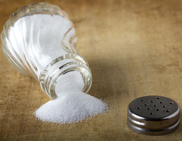 table salt spilled onto table