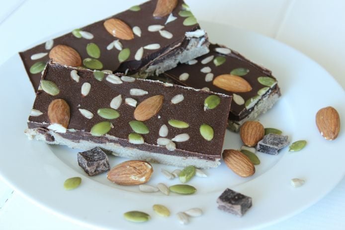 Need a snack? This Paleo energy bars recipe is made with bananas and packed with hearty nuts and seeds to keep you satisfied throughout the day.
