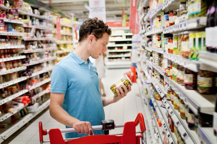 Man reading food labels