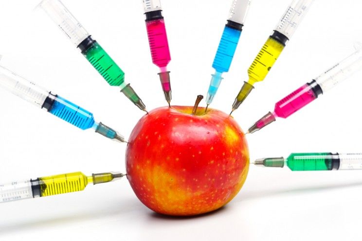 apple injected with syringes