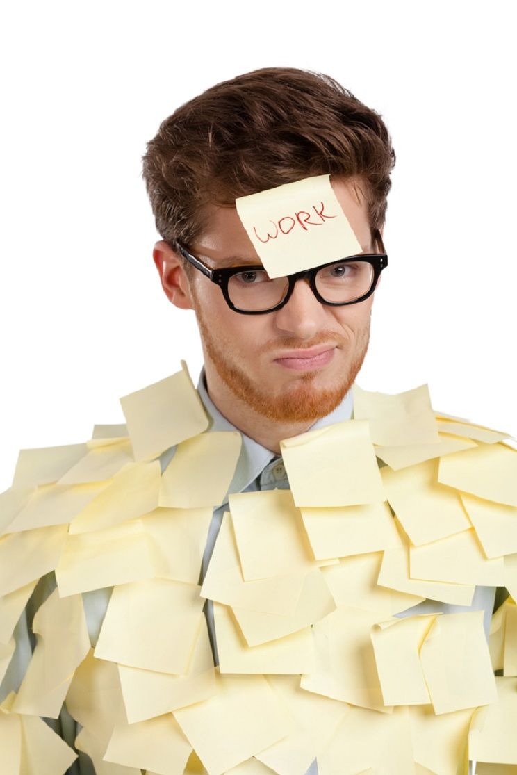 man covered in yellow sticky notes