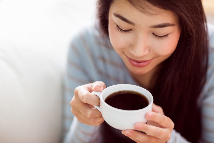 woman drinking coffee