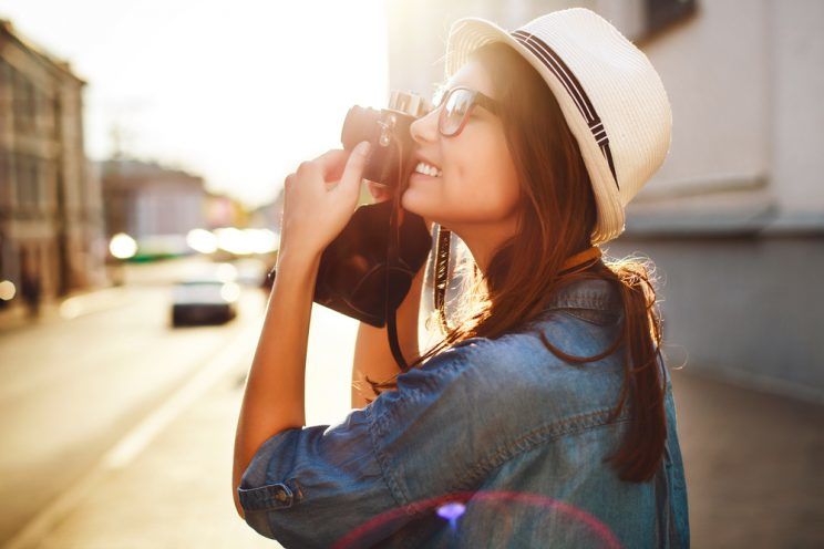 woman taking pictures