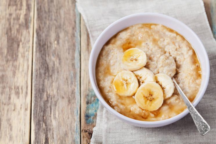 Bowl of oatmeal porridge with banana