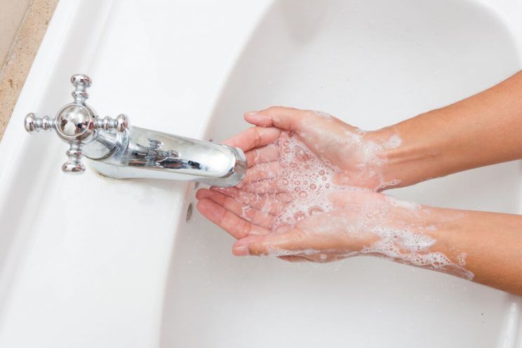 Washing hands with water