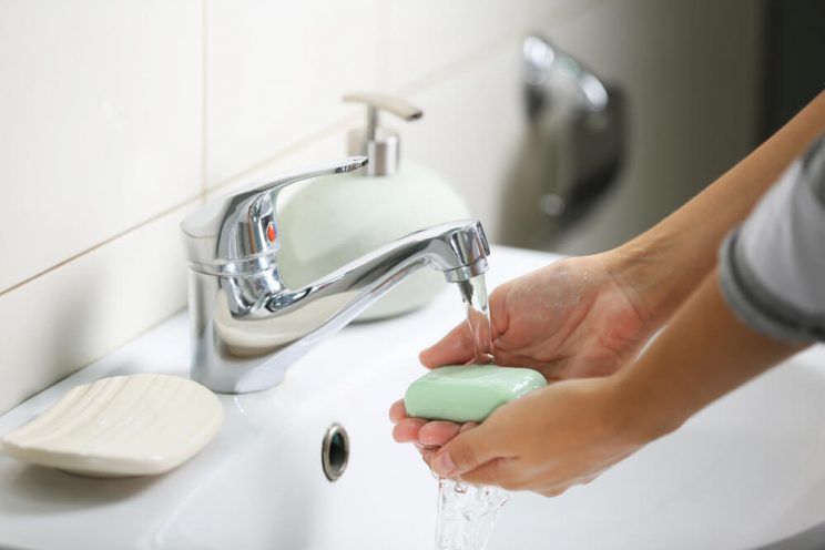 Washing of hands with soap