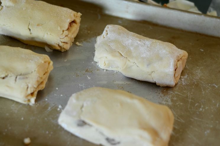 dough rolls on baking sheet