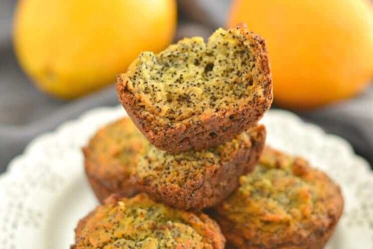 stacked orange poppy seed muffins