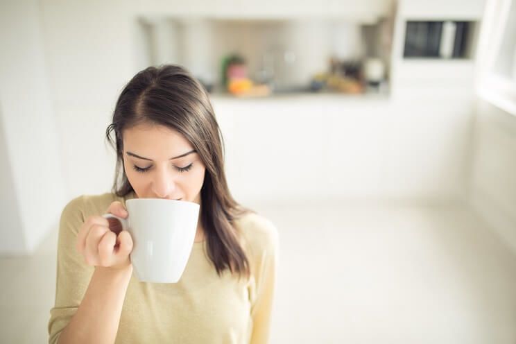 woman drinking coffee