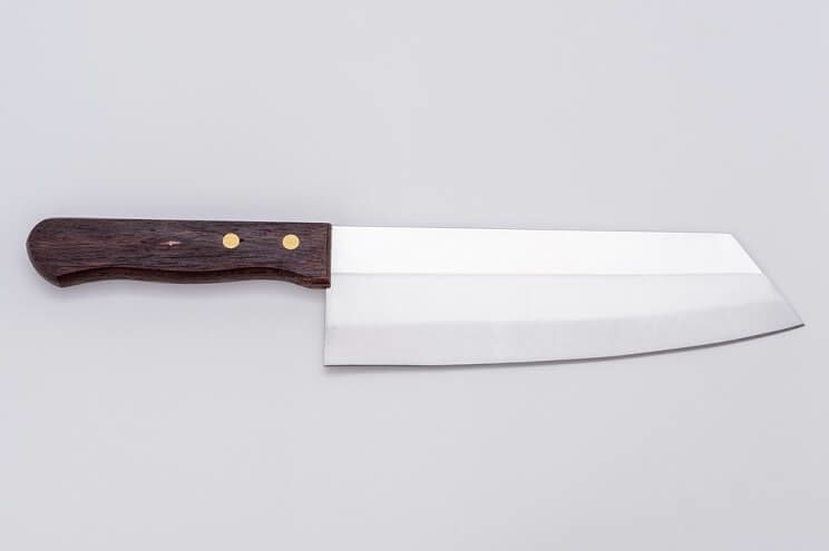santoko knife on grey background