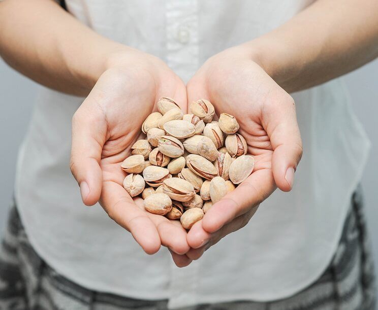 pistachios in hands