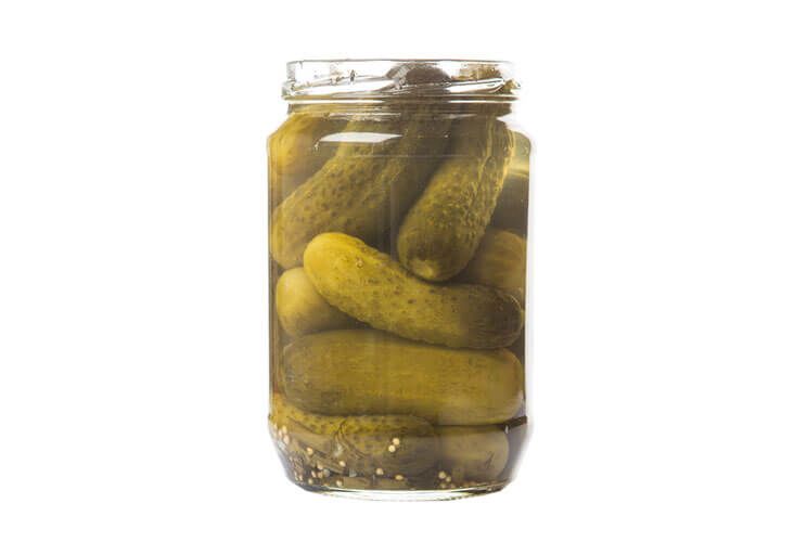 dill pickles in a jar