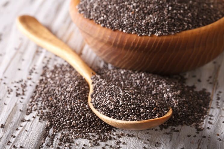 chia seeds in a wooden spoon