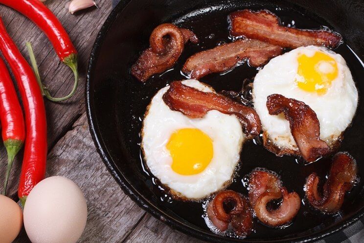 bacon and eggs in a skillet