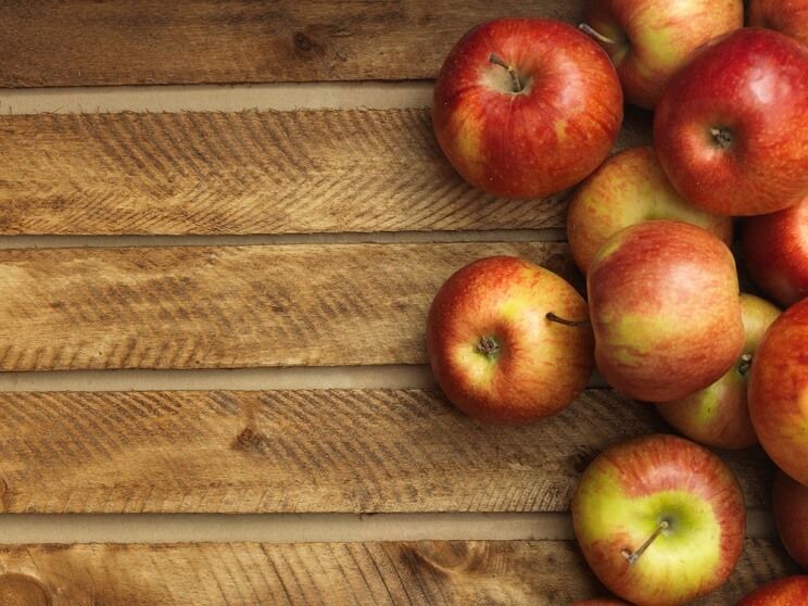 apples on wooden background