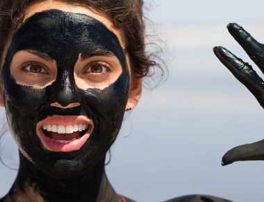 woman with clay mask