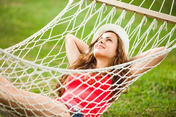 woman resting in hammock