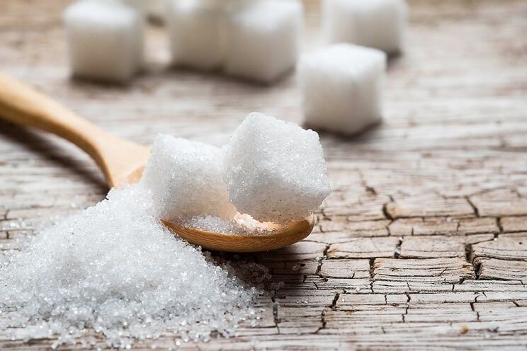 sugar cubes on a spoon