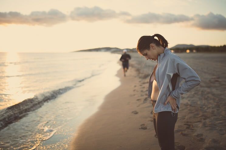 depressed woman at the beach