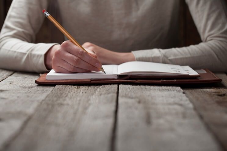 woman journaling her thoughts