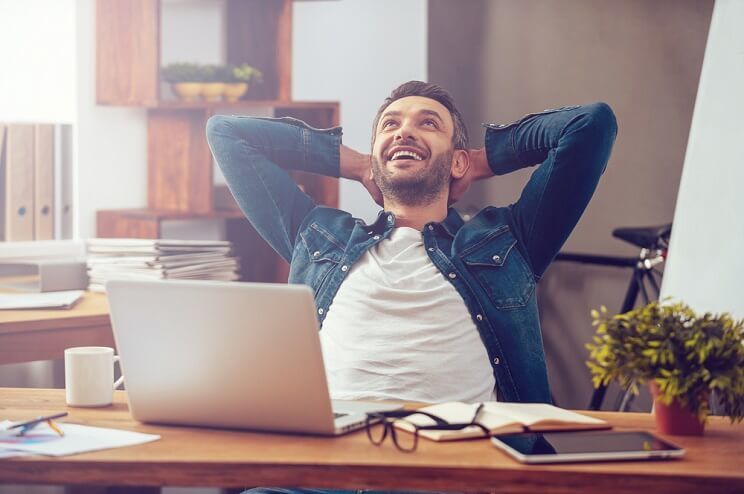 man at computer without stress