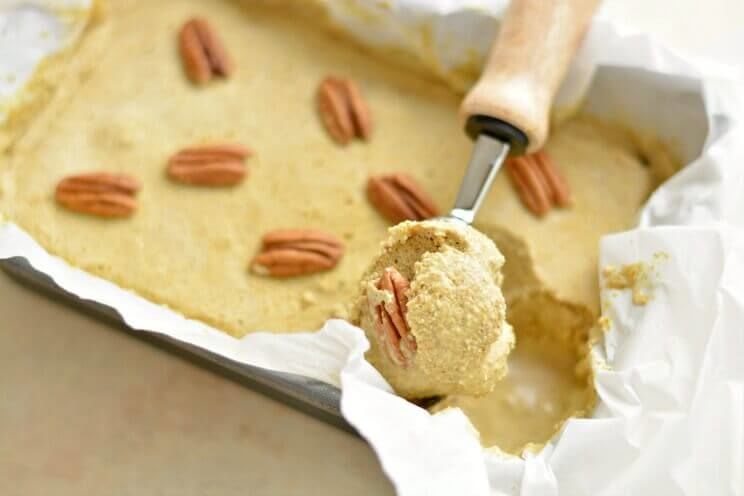 golden milk ice cream being scooped