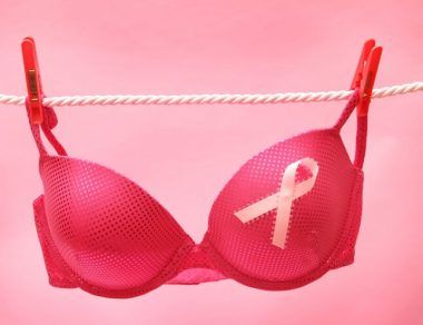 bra on a clothesline with pink ribbon