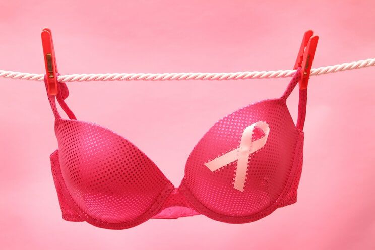 bra on a clothesline with pink ribbon