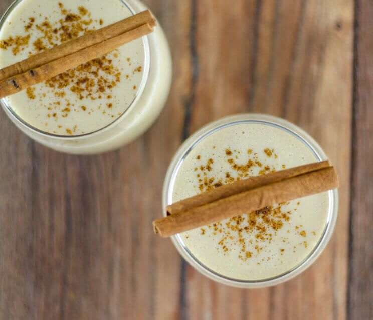eggnog in glasses with cinnamon