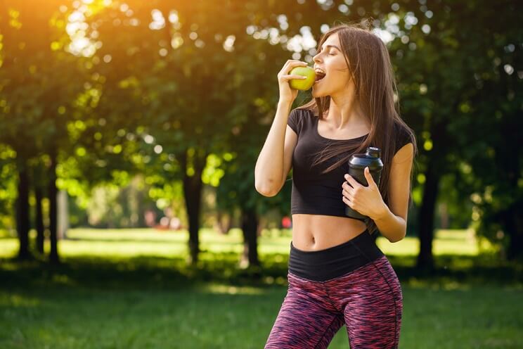 runner eating an apple