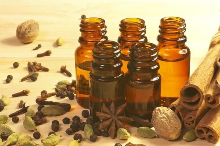 essential oil bottles with nutmeg