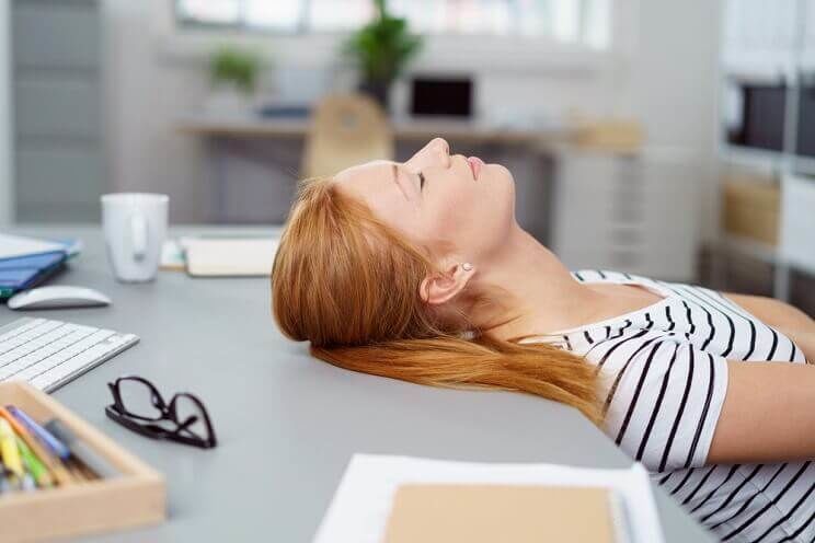 woman napping at her desk
