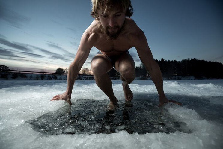 man entering ice bath