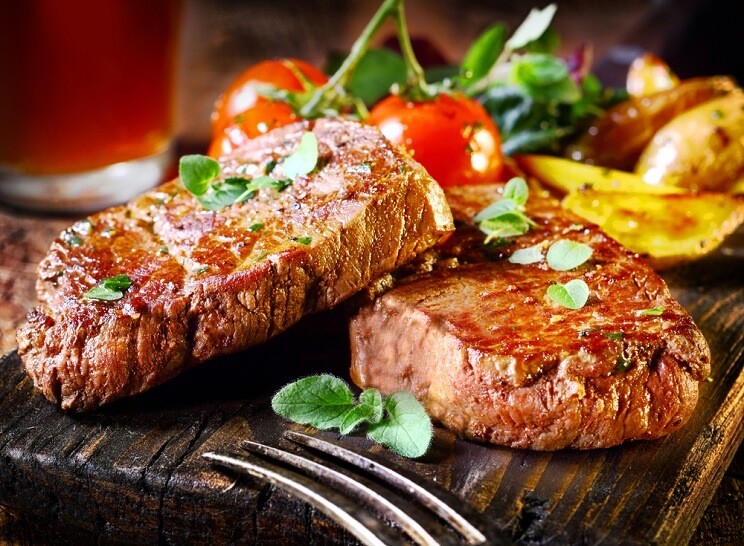 steak and grilled vegetables