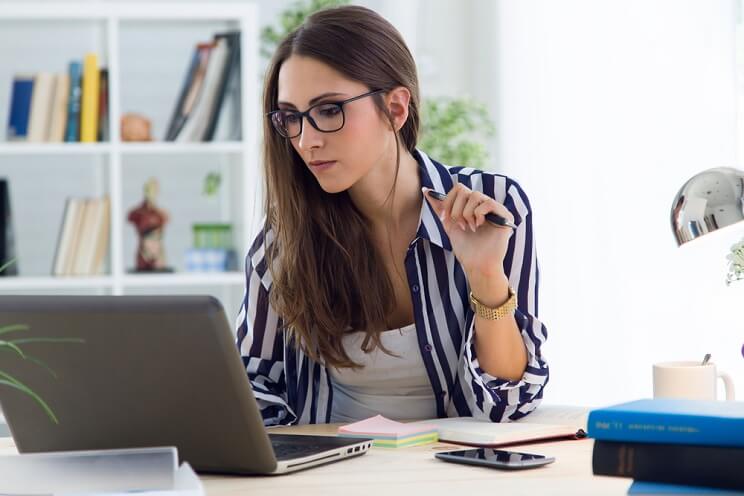 woman at her desk at work