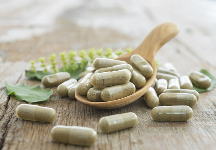 supplements on a wooden table