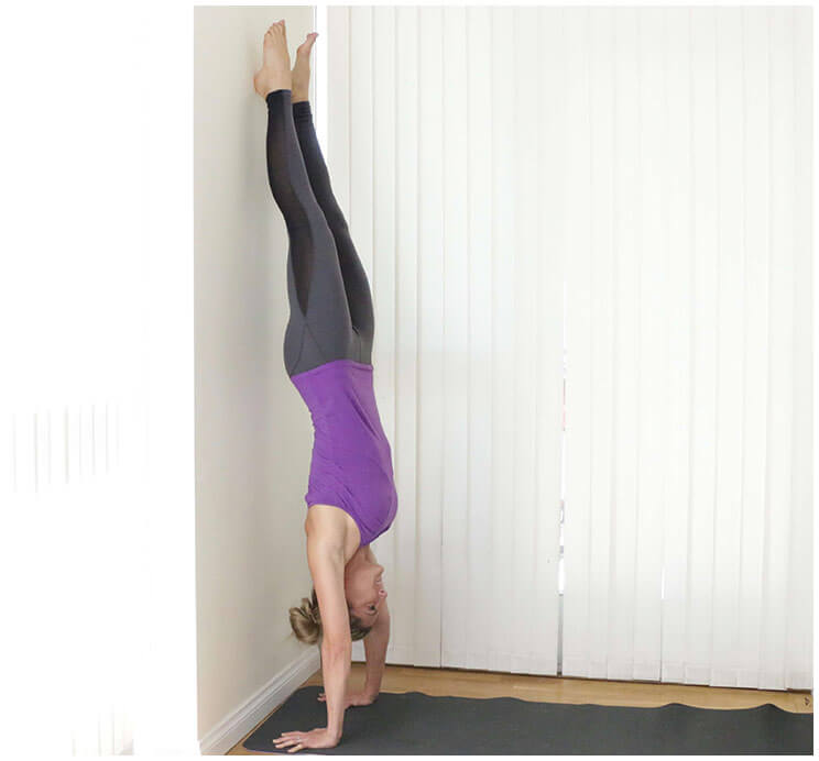 handstand against the wall