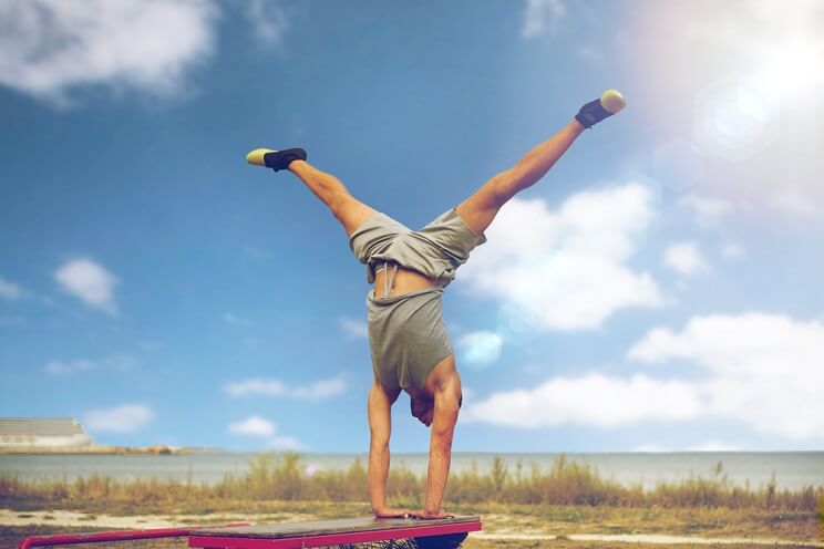 man doing hand stand