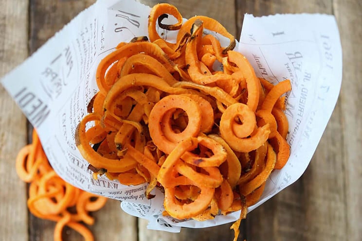 Sweet potato curly fries tossed in beef tallow make a healthy snack for both kids and grown-ups!