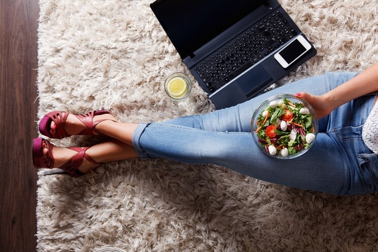 woman eating salad