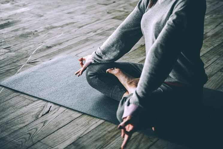 girl in lotus position