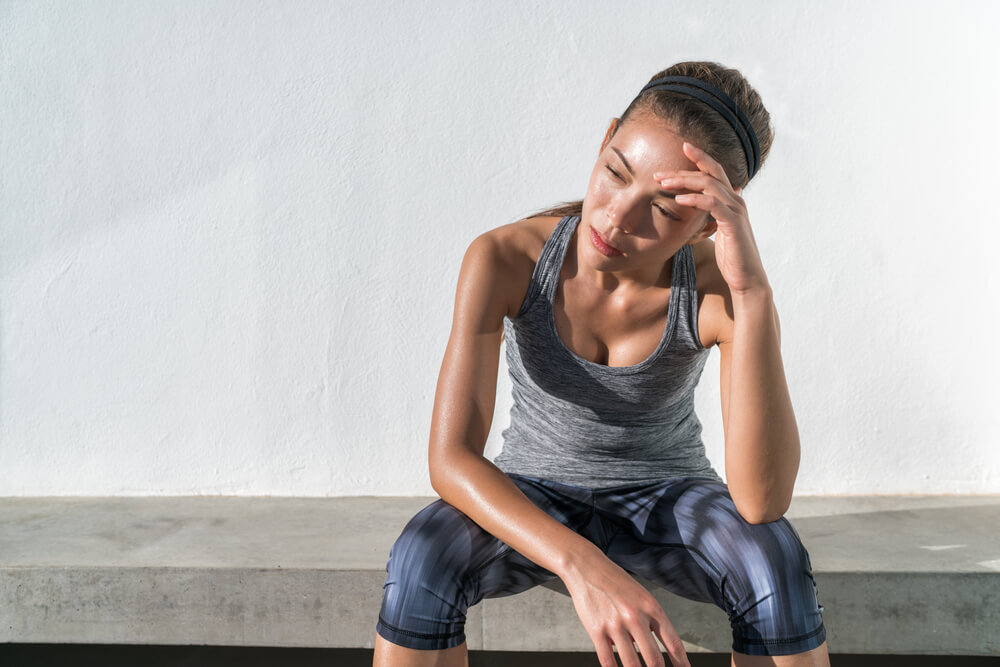 tired woman at the gym