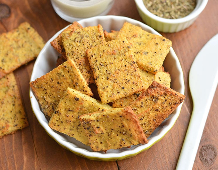 These easy, grain-free garlic and herb crackers bake to perfection in just 30 minutes. Gluten-free garlic herb crackers is better than wheat thins!