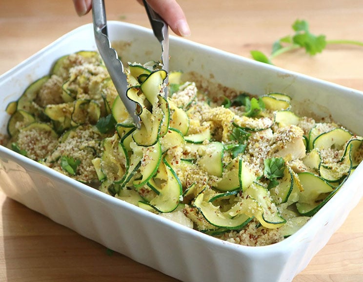 Tender chicken & zucchini noodles are tossed in a spicy coconut sauce and finished with a crispy almond meal topping for a healthy take on noodle casserole.