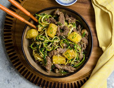 This one pot stir-fry is made with tender slices of beef sautéed with juicy sweet pineapple chunks and soft zucchini noodles.