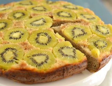 Sweetened with bananas and accented with creamy cashew butter, this cake is reminiscent of banana bread with a burst of fresh kiwis on top.